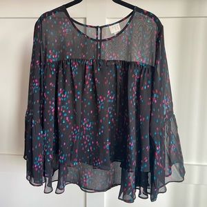 Semi-sheer ruffled top